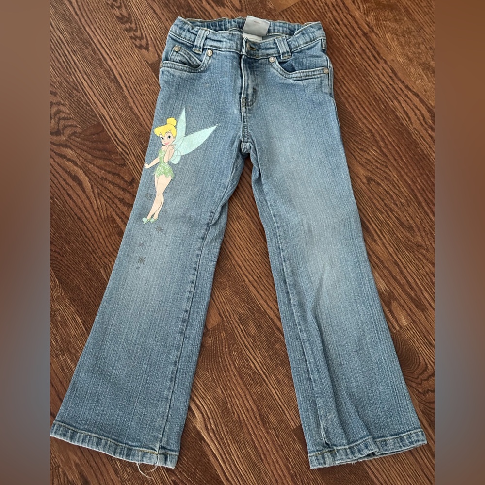 Tinker Bell embossed light wash jeans from Disney Store snap and zipper closure